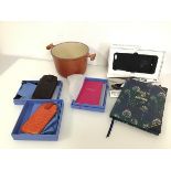 A mixed lot including a Liberty, London Guest and Menu book, a Smythson, London pink notebook, two