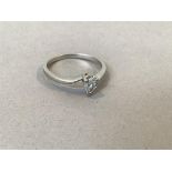 A 18ct white gold crossover ring mounted with brilliant cut diamond in claw setting (0.5ct) (4g) (