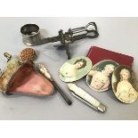 A group of items including a perfume atomiser purse, three transfer printed portrait miniatures on