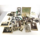 An assortment of 20thc photographs, including Family Portraits, Sports Team, Animals, Holiday