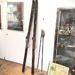 A pair of Gold Crown plywood skis retailed by Lillywood of Picadilly Circus with old style bindings,