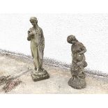 A composition garden statue of a Female Nude holding a Bird, and a garden fountain composed of