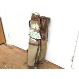 Two vintage canvas leather mounted golf club bags and two hickory shafted clubs etc. (tallest bag: