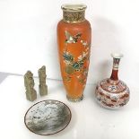 An early 20thc Japanese baluster shaped vase with orange ground and bird and foliate decoration,