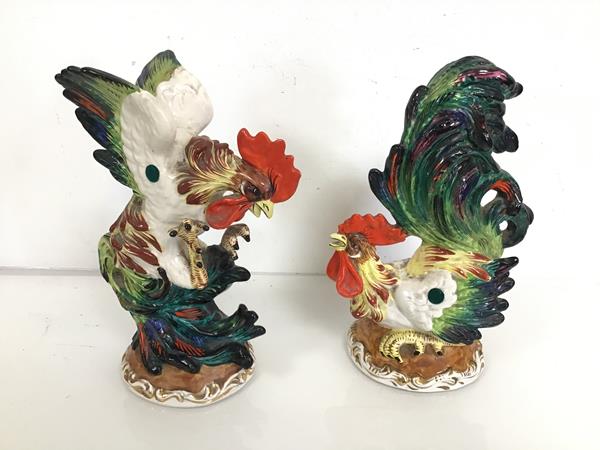 A pair of ceramic Italian polychrome cockerals, one marked Jaffe Rose (25cm x 19cm x 12cm)