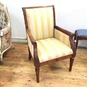 A reproduction Napoleon III Empire style bergere in yellow toned upholstery (100cm x 70cm x 68cm)