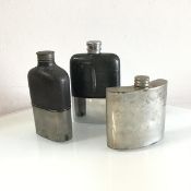 A 1930s chromium plated tooled leather mounted hip flask with removeable drinking cup, a pewter