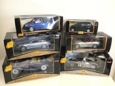 Maisto diecast model cars including an Audi, Mercedes Benz, Austin Martin, Volkswagen, Dodge and
