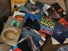 A large collection of 1960s/70s and 1980s LPs including Elvis Costello, Rolling Stones, Carol
