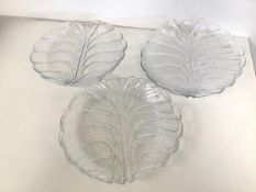 A set of seven glass plates in the form of cabbage leaves (25cm)