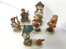 A collection of Hummel figures (largest: 14cm x 7cm) (6)