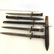 A collection of 20thc. bayonets, one with a Fasces in relief and the letters M.V.S.N. (33cm) (6)