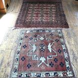 A Bokhara rug, the centre panel with three rows of seven octagons enclosed within a stylised leaf