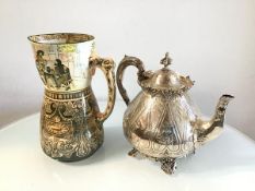 An Epns tapered engraved and chased teapot with crenallated top (h.21cm) and a Doulton Burslem