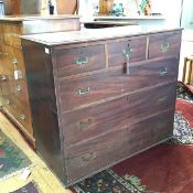 A 19thc mahogany two part Campaign chest, the rectangular top with moulded edge fitted three short