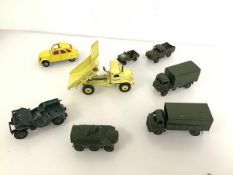 A collection of diecast model military vehicles by Dinky and others, also a Dinky Eyclid rear dump