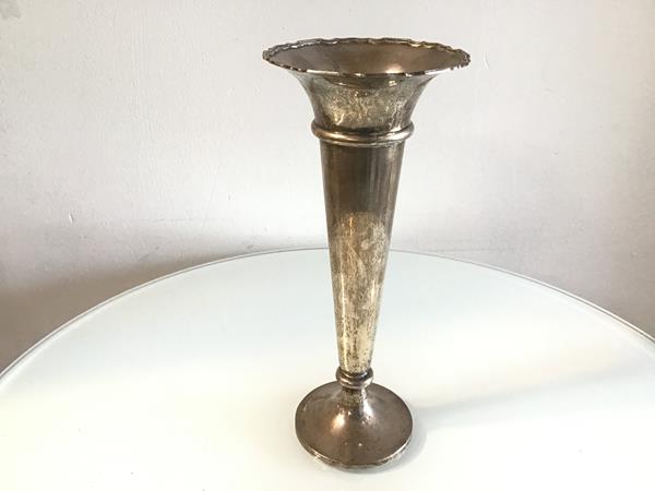 A Sheffield silver tapered flower tube with scalloped border raised on circular moulded base (h.