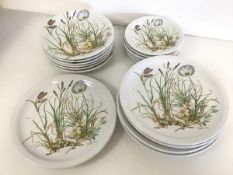 A set of six Pillivuyt plates, all with grass and wild flower decoration, signed Molling and stamped