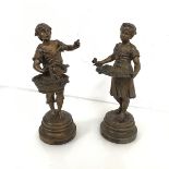 A pair of spelter figures, one titled Les Roses the other Les Cerises (h.29cm)