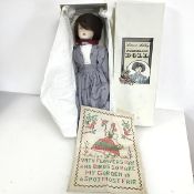 A Laura Ashley porcelain doll (38cm) with original box, and an embroidered panel with Girl and