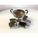 An Edwardian London silver miniature two handled trophy, a Chester silver salt and a Birmingham