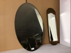 An oval bevelled glass wall mirror (75cm x 51cm) and another in wooden frame (2)