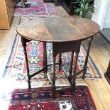 An early 20thc oak gateleg occasional table with oval top (60cm x 67cm x 52cm)