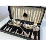 An Epns 1950s dessert service including six dessert forks and spoons, complete with serving spoon in