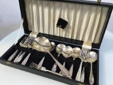 An Epns 1950s dessert service including six dessert forks and spoons, complete with serving spoon in