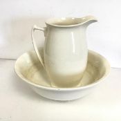 An early 20thc creamware basin and ewer set (26cm x 24cm x 15cm)