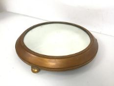 A Victorian circular stand, with mirror top within Greek key decorated frame, on bun feet and