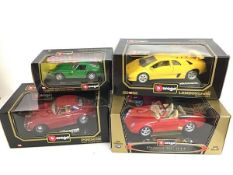 Bburago diecast model cars including two Porsches, Lamborghini and a Ferrari, all in original