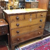 A 19thc blonde mahogany chest, the rectangular top with fluted edge above three short and three