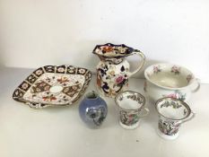 A mixed lot of china including a Royal Copenhagen bud vase, a pair of Royal Doulton tea cups, a