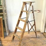 A distressed set of 1920s folding steps with paint finish (128cm x (widest) 82cm)