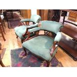 A pair of Edwardian mahogany inlaid horseshoe back tub chairs, with upholstered back, arms and seat,