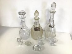 Three decanters, one with Birmingham silver label and two cut glass footed dishes, an Owl table
