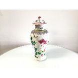 A 19thc Chinese famille rose baluster vase and cover decorated with peony and chrysanthemum