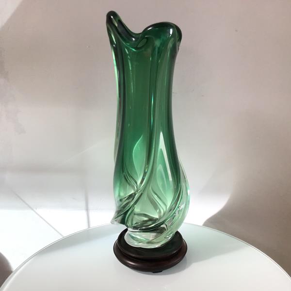 A 1960s Austrian green to clear spiral Art Glass vase raised on hardwood stand, unsigned (h.50cm x