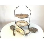 An Epns two tier cakestand, a three piece white metal chased Art Nouveau style dressing table