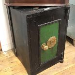 An Impregnable Fireproof chest steel safe, with brass handle, complete with interior pair of