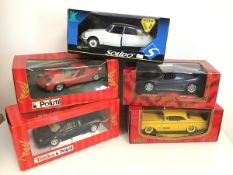 A collection of diecast model cars including two Polistil Lamborghinis, a Mira Ferrari and a Mira