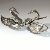 A pair of Continental crystal Swans with 835 Standard white metal mounts (7cm x 7cm x 4cm),