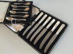 A set of six Birmingham silver coffee spoons, complete with fitted case and a set of six mother of