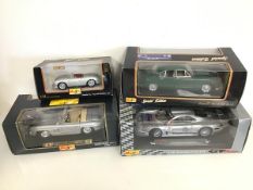 Maisto diecast model cars, including a Jaguar, Mercedes, Mercedes Benz and Porsche, all in