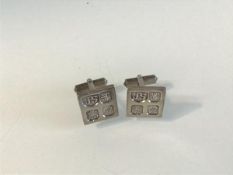 A pair of Edinburgh silver square sleevelinks, approximately 2cm square, makers mark J.S. (19.64g)