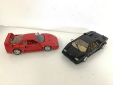 A Bburago Ferrari F40 (7cm x 23cm x 11cm) and a Tonka Lamborghini (2)