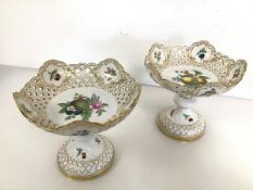 A pair of 20th century Meissen comports with fruit decoration and pierced edge (h.16cm x d.18cm)