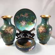 A group of four Chinese cloisonne enamelled vases, plates and dish, decorated with honeysuckle