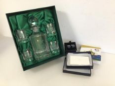 Golf Interest: a Carnegie Club decanter and four whisky glasses, a Rider Cup business card holder,